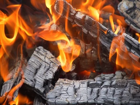 Fire: burning wood and smoldering embers Stock Footage
