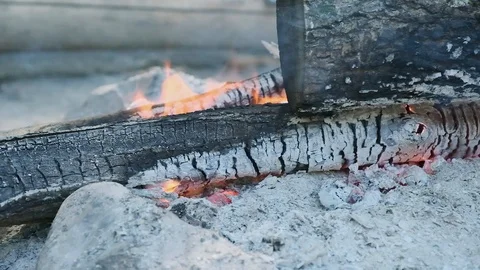 Fire burning wood during a halt. Stockbeeldmateriaal 97730698