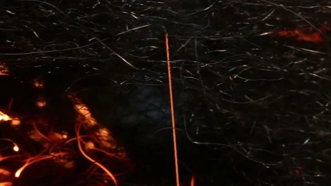 Fire Burns along Threads MAC Stock Footage 74542556