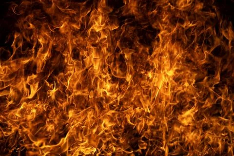 Fire burns behind flame. Fire surrounds bright flame. Realistic fire for overlay Stock Photos