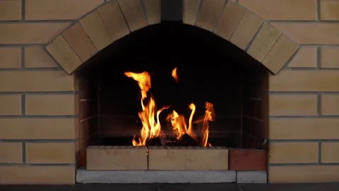 Fire burns in the brick oven. Outdoor summer kitchen oven for BBQ grill. Stock Footage 155284821