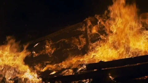 Fire burns with a bright flame Stock Footage 82407729
