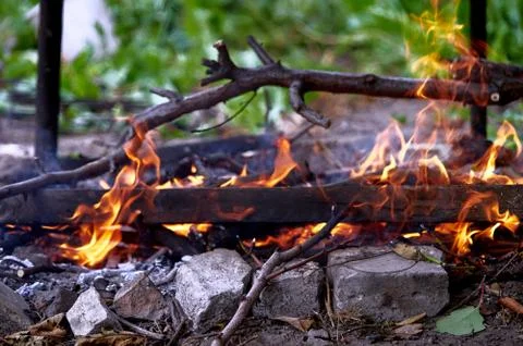 The fire burns with a bright flame Stock Photos
