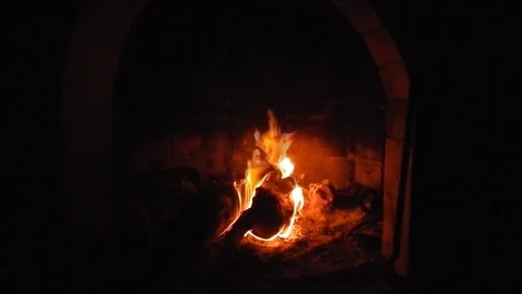 Fire burns in the crackling fireplace Stock Footage 105200805