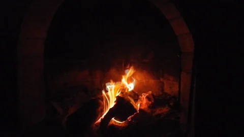Fire burns in the crackling fireplace Stock Footage 105201035