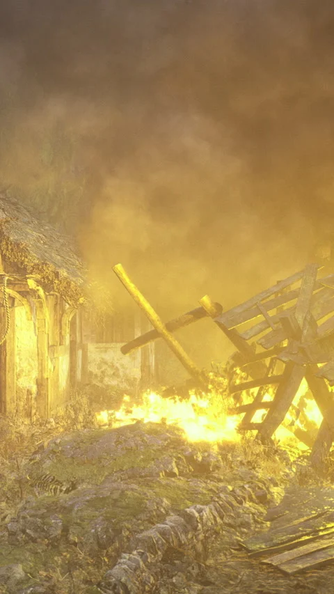 Fire burns down a house in a rural area during the night with flames and smoke 스톡 동영상 334884366