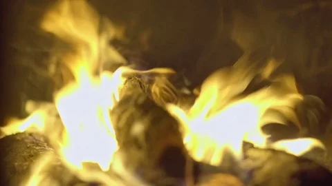 The fire burns in the fireplace. 4K Stock Footage 74744422
