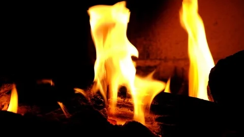 A fire burns in a fireplace. Close up view of fire flames Stock-Footage 101928689