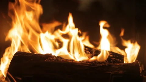 Fire burns in the fireplace. Evening mood. Holiday concept. Background. Stock Footage 106846327