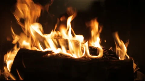 Fire burns in the fireplace. Evening mood. Holiday concept. Background. Stock Footage 106846346