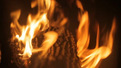 Fire burns in the fireplace. Evening mood. Holiday concept. Background. Stock Footage 106846410