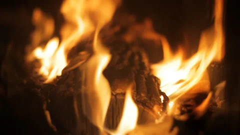 Fire burns in the fireplace. Evening mood. Holiday concept. Background. Stock Footage 106846444