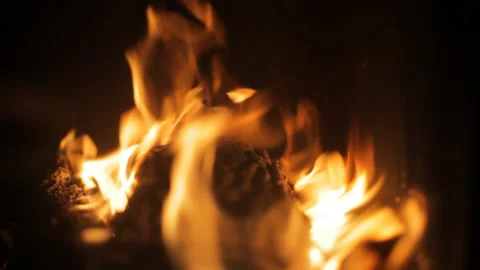 Fire burns in the fireplace. Evening mood. Holiday concept. Background. Stock Footage 106846457