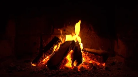 A fire burns in a fireplace, Fire to keep warm Stock Footage 81832092