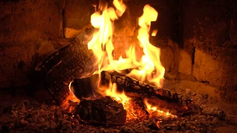 A fire burns in a fireplace, Fire to keep warm Stock Footage 82435268