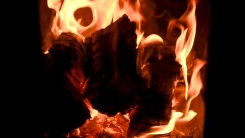 A fire burns in a fireplace. Fire to keep warm. Stock Footage 168984190