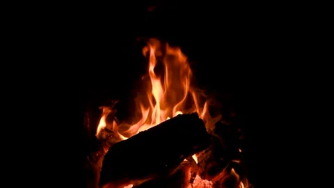 A fire burns in a fireplace. Fire to keep warm. Stock Footage 211167250