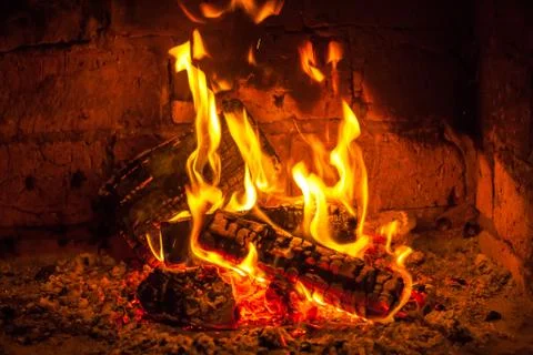 A fire burns in a fireplace, Fire to keep warm Stock-Fotos