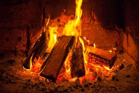 A fire burns in a fireplace, Fire to keep warm Stock-Fotos