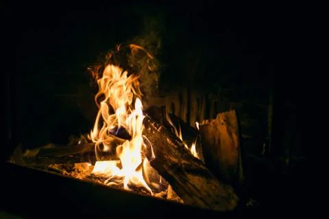 A fire burns in a fireplace, Fire to keep warm. Фото