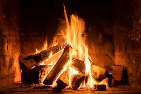 A fire burns in a fireplace, Fire to keep warm Stock-Fotos