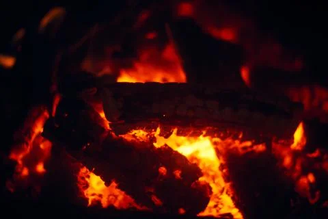 A fire burns in a fireplace, Fire to keep warm. Logs burning in a fireplace Stock-Fotos