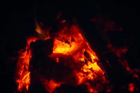 A fire burns in a fireplace, Fire to keep warm. Logs burning in a fireplace Foto stock