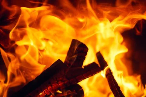 A fire burns in a fireplace, Fire to keep warm. Logs burning in a fireplace Foto stock