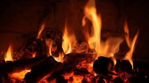 A fire burns in a fireplace Stock Footage 71280156