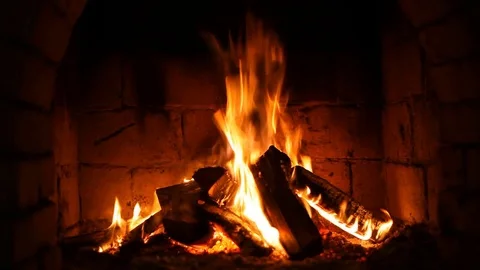 A fire burns in a fireplace Stock Footage 73352458