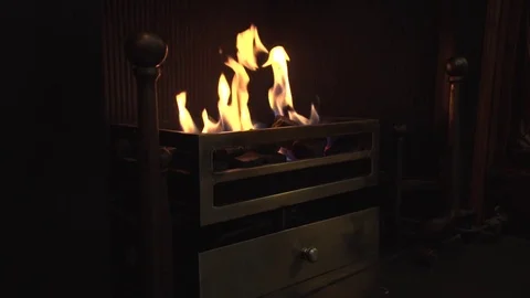 Fire burns in the fireplace. Video stock 82857461