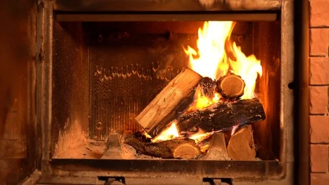 A fire burns in a fireplace Stock Footage 101466045