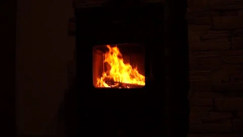 Fire burns in a fireplace Stock Footage 133343385