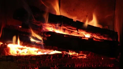 Fire burns in the fireplace. Stock Footage 145330714