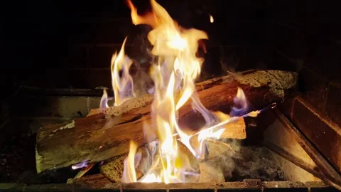 A fire burns in a fireplace Stock Footage 266878653