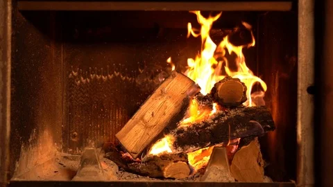A fire burns in a fireplace slow mo Stock Footage 101467317