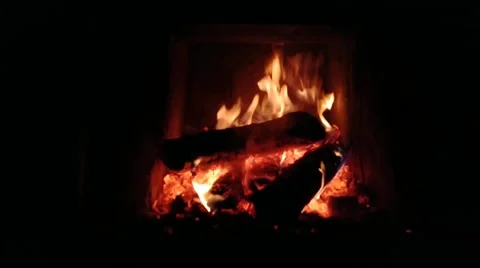 The fire burns in the fireplace. Warmth and home comfort. Stock Footage 170072237