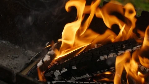 The fire burns in the grill to make a kebab Stock Footage 115522920