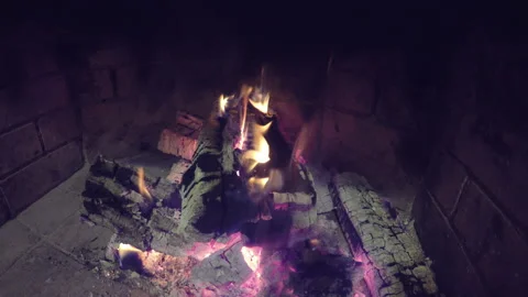 Fire burns out in the fireplace Stock Footage 148423067