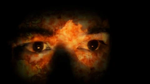 Fire Burns Reflected On Hidden Man Face Stock Footage 114969233