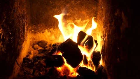 The fire burns slowly in the fireplace Video stock 144630364