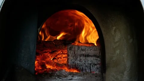 Fire burns in the stove for cooking Stock Footage 130797126