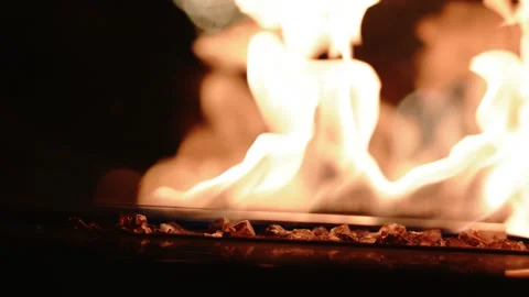 The fire burns on the summer terrace. Fire texture. Stock Footage 259327785