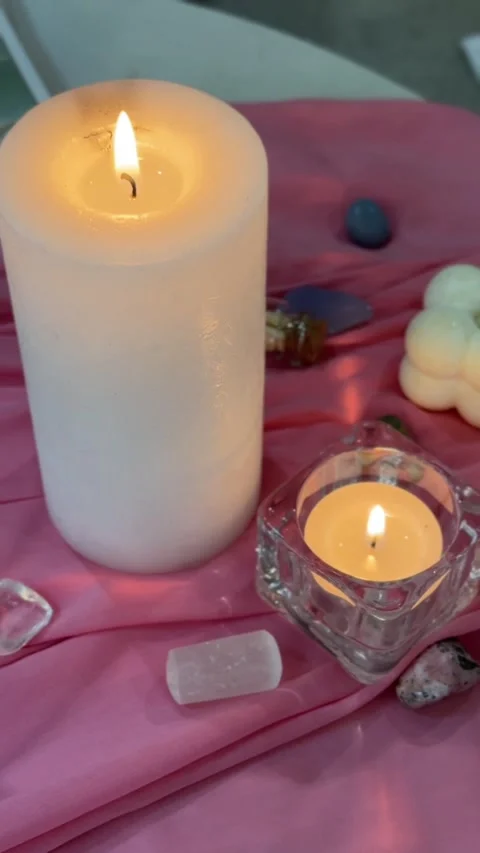 Fire burns in the testimonies on the tarot reader's table with various stones Stock Footage 332466467