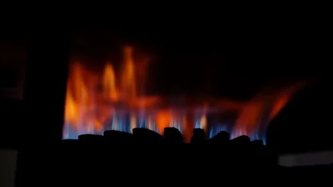  fire burns under the pot- slow motion Video stock 80416479