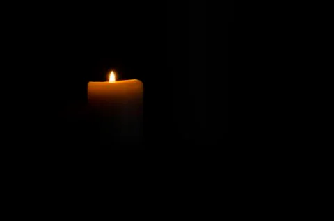 Fire Candle In Black Stock Photos