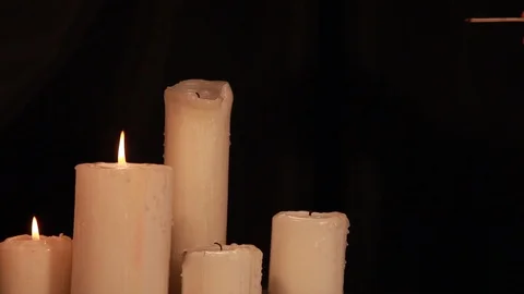 Fire to the candles Stock Footage 94554313
