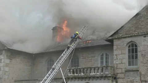 Fire at Castle Lostwithiel in Cornwall, the United Kingdom on 21 December 2019 Stock Footage 145872771