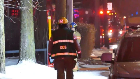 Fire chief passing with electronic tablet Stock Footage 101999432