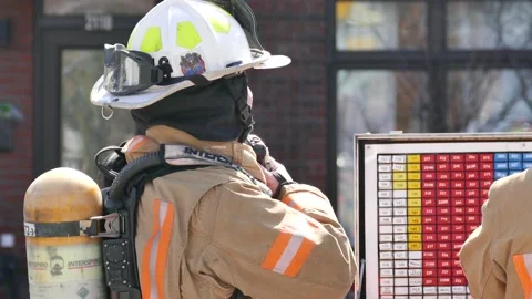 Fire Chief speaking at radio Stock Footage 139664186